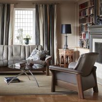 Sillón contemporáneo / de cuero / de madera...