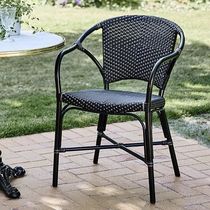 Silla contemporánea / de ratán / con base...