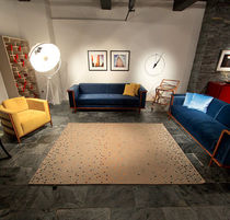 Alfombra contemporánea / con motivos decorativos...