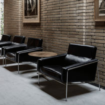 Sillón de diseño escandinavo / de cuero...