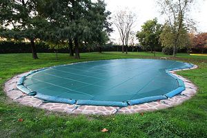 cubierta para piscina con ojales