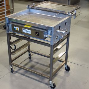 mesa de preparación para glasear bollería