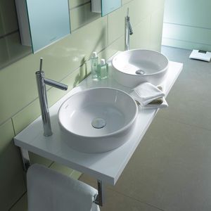 lavabo sobre encimera / redondo / de cerámica / contemporáneo
