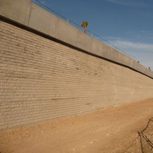bloque de hormigón macizo / para muro de contención / para cerca / para tabique