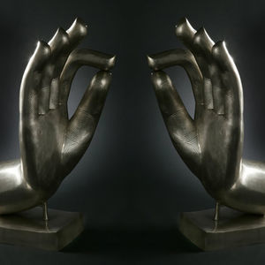 escultura de latón