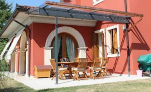 pérgola adosada
