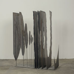 escultura de metal