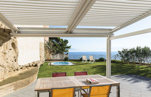 pérgola adosada