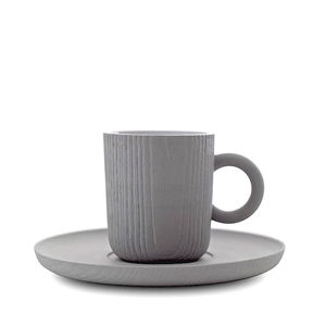 taza de café de porcelana