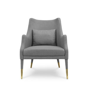 sillón contemporáneo / de tejido / de cuero / de latón pulido