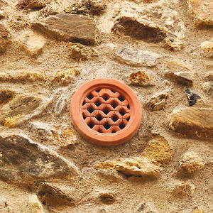 rejilla de ventilación de piedra