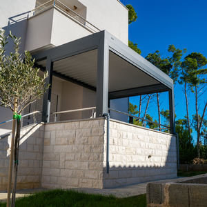 pérgola adosada