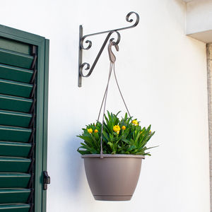 soporte de pared para plantas en maceta