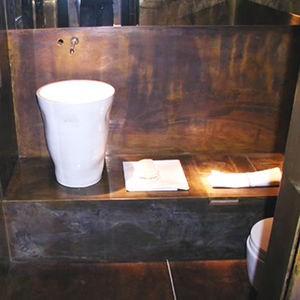 lavabo sobre encimera / redondo / de cerámica / moderno