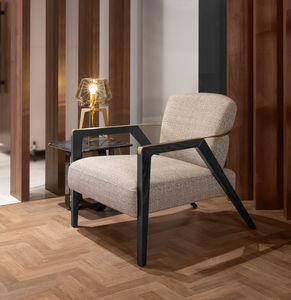 sillón moderno / de cuero / de nogal / de fresno