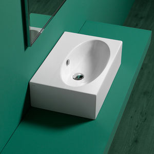lavabo sobre encimera / rectangular / de cerámica / contemporáneo