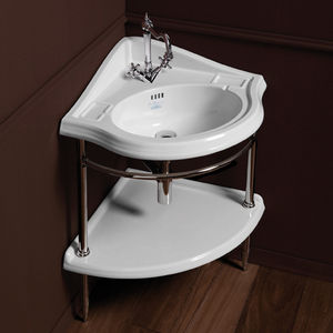 lavabo suspendido / de esquina / de cerámica / clásico