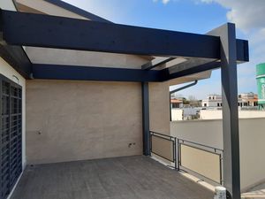 pérgola adosada