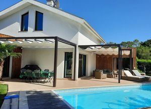 pérgola adosada