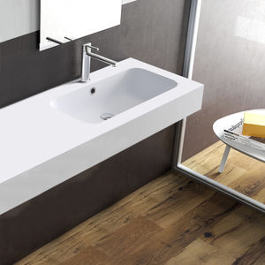 lavabo suspendido / rectangular / de cerámica / contemporáneo