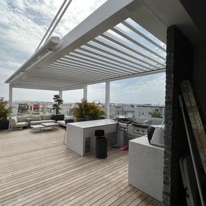 pérgola adosada