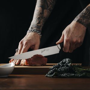cuchillo para trinchar con mango de plástico