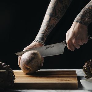 cuchillo de chef con mango de plástico
