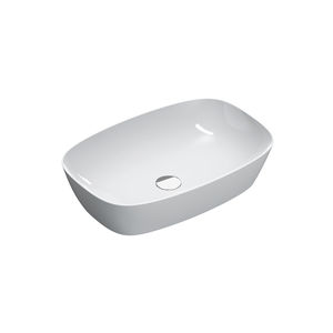lavabo sobre encimera / ovalado / de cerámica / para el sector servicios