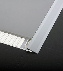 perfil de transición de latón / de aluminio anodizado / para baldosas / para moqueta