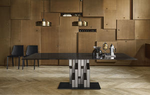 mesa de diseño original / de vidrio / con base metálica pintada / rectangular