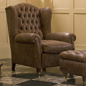 sillón Chesterfield / de tejido / de cuero / con orejas