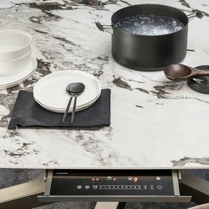 mesa con plancha de cocción