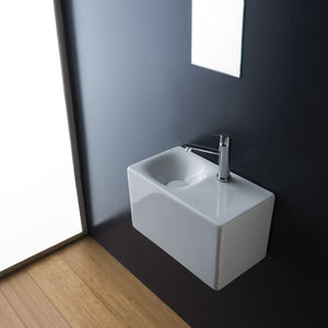 lavabo suspendido / rectangular / de cerámica / contemporáneo