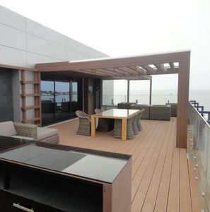 pérgola adosada / de madera compuesta / modular