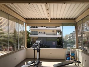 pérgola adosada