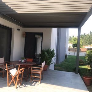 pérgola adosada