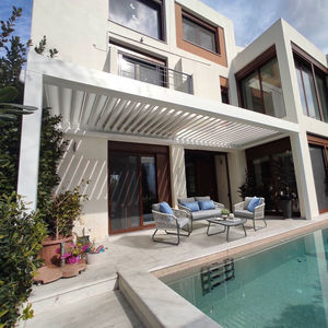 pérgola adosada