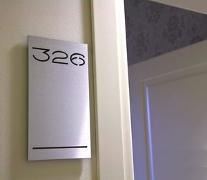 placa de señalización de pared