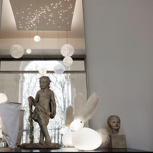 escultura de latón
