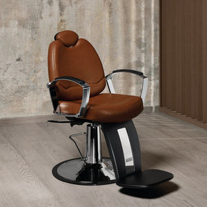 sillón de barbero de metal cromado