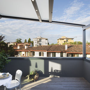 pérgola adosada