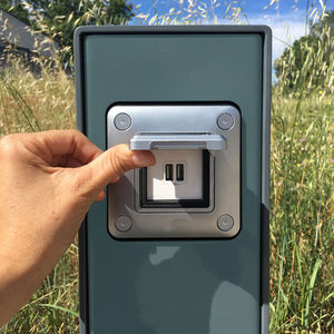 puesto de recarga USB