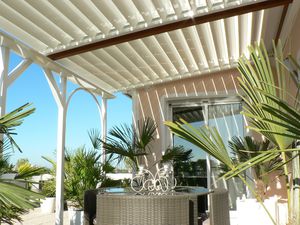 pérgola adosada