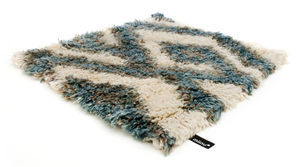 alfombra contemporánea / con motivos / de lana / rectangular