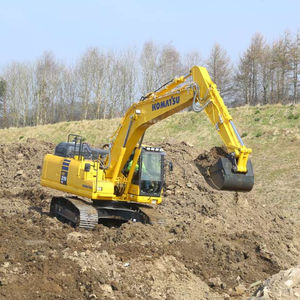 excavadora intermedia / con orugas / para obra / diésel