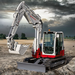 excavadora intermedia