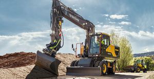 excavadora intermedia / con neumáticos / de bajo consumo de combustible / giratoria
