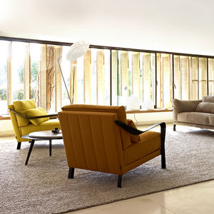 sillón contemporáneo / de tejido / de aluminio fundido / de Pascal Mourgue
