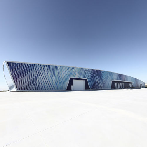 Revestimiento de fachada de paneles - NAVE INDUSTRIAL MAQUINARIA CONSERVERA TOMÁS GUILLÉN - Umetal - de metal / sostenible / pintado