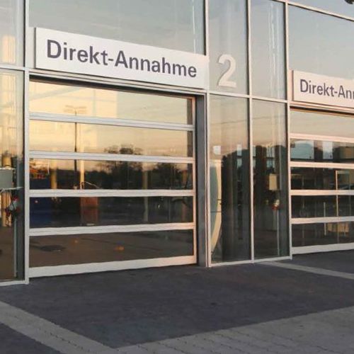 Puerta industrial seccional - PANORAMA 40 | PANORAMA 60 - Promstahl - de aluminio / de Plexiglas® / automática